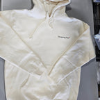 White hoodie with a brand logo on a gray surface